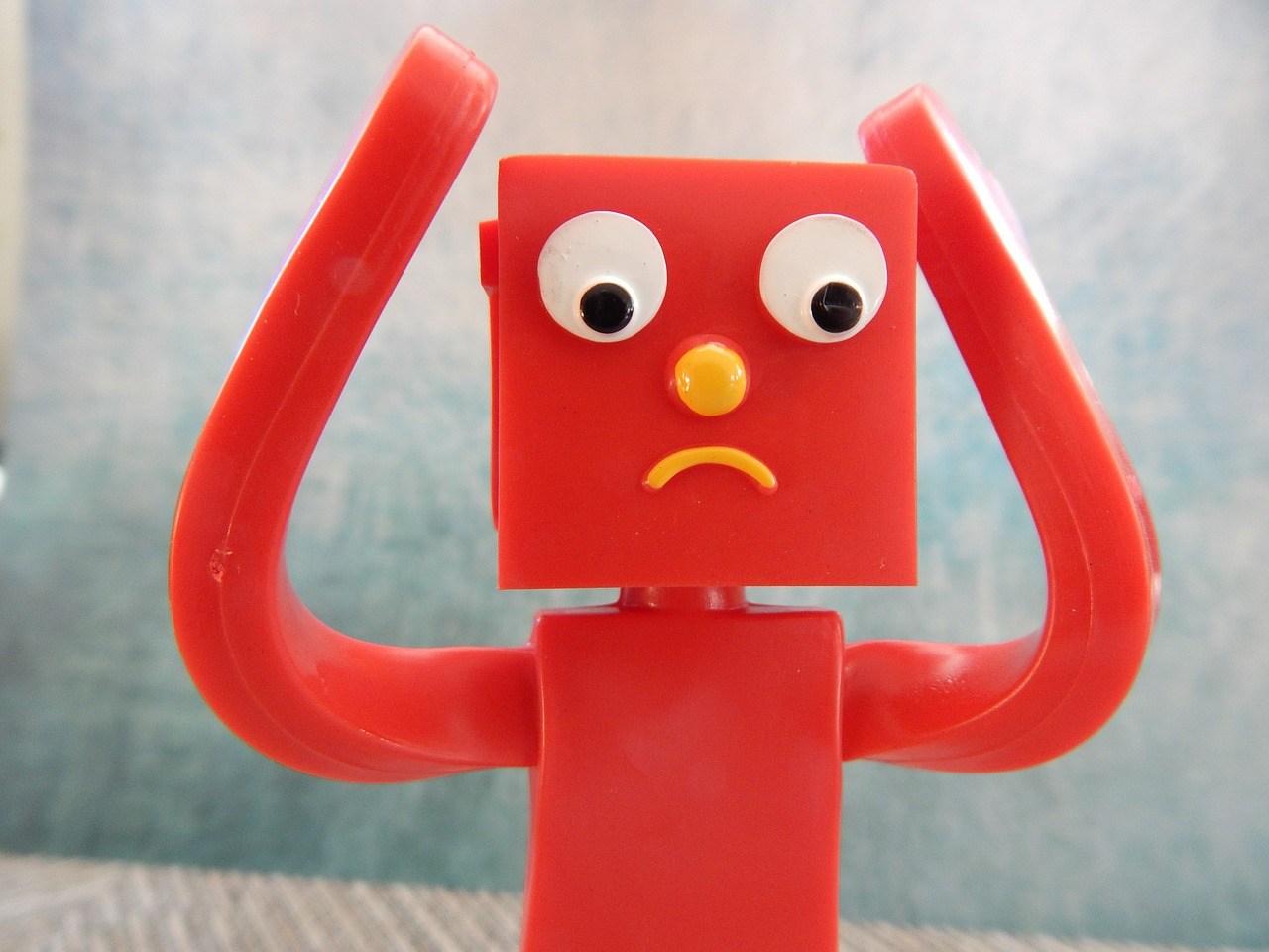 A confused robot who needs the help of a web design company near Guildford