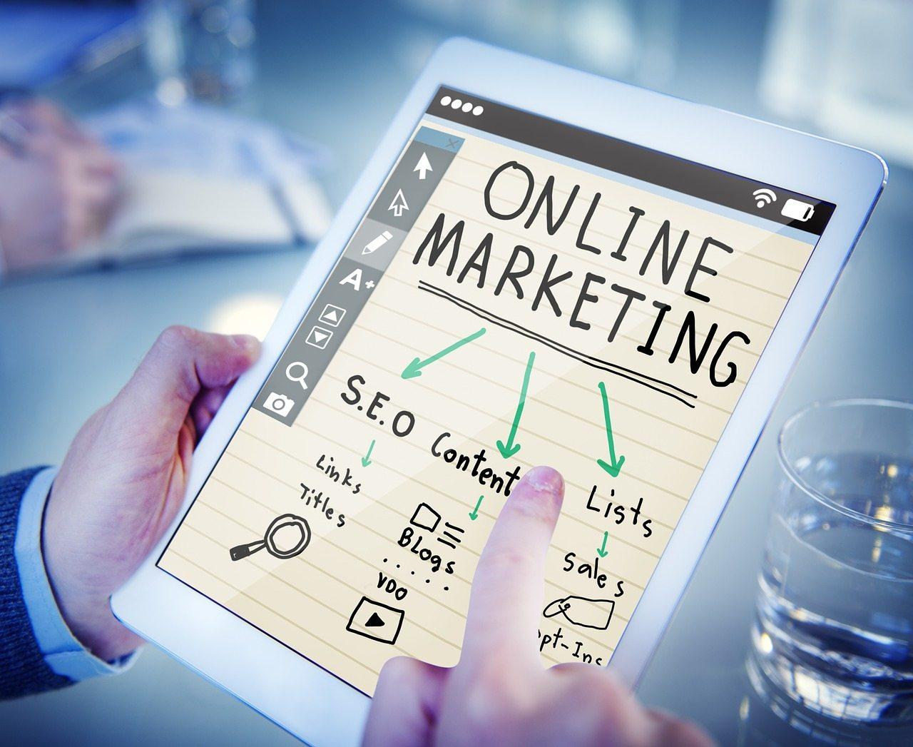 A tablet with an online marketing diagram, being used at a web agency in Surrey