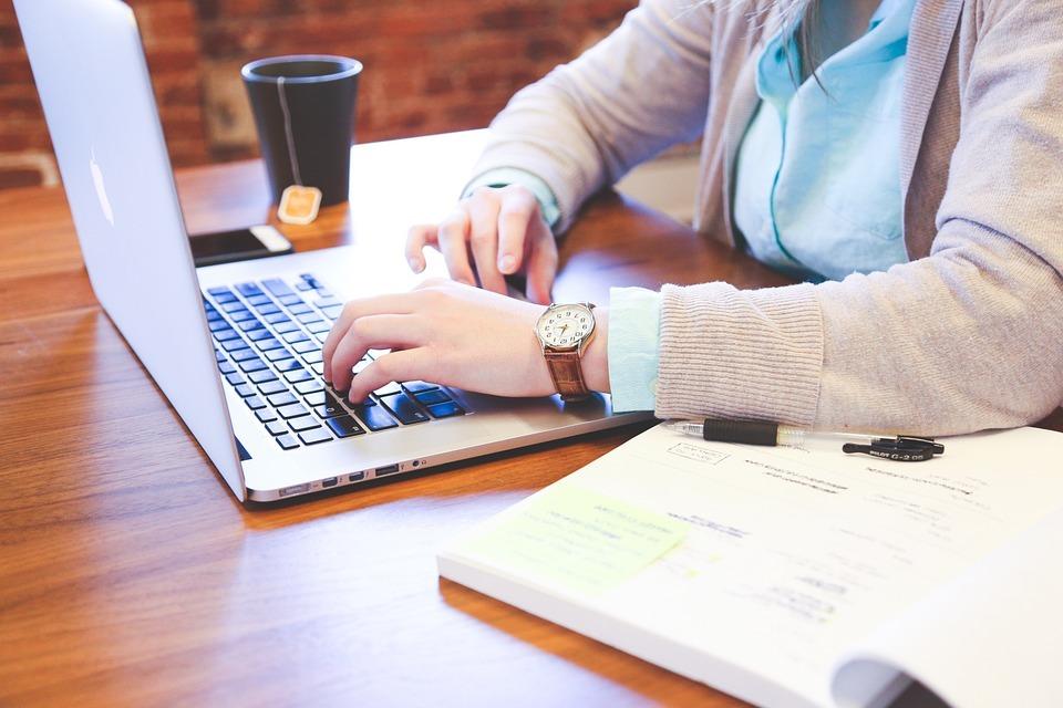 An image of someone typing on a keyboard | Social Media Surrey | Thunderbolt Digital