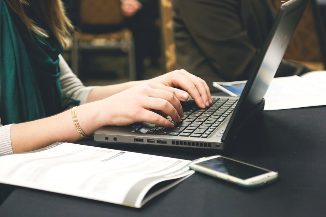 Woman Typing | SEO Company Surrey