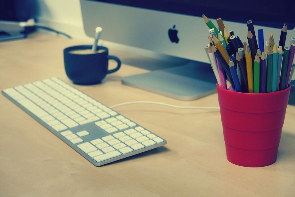 computer with crayons in front - web development agency