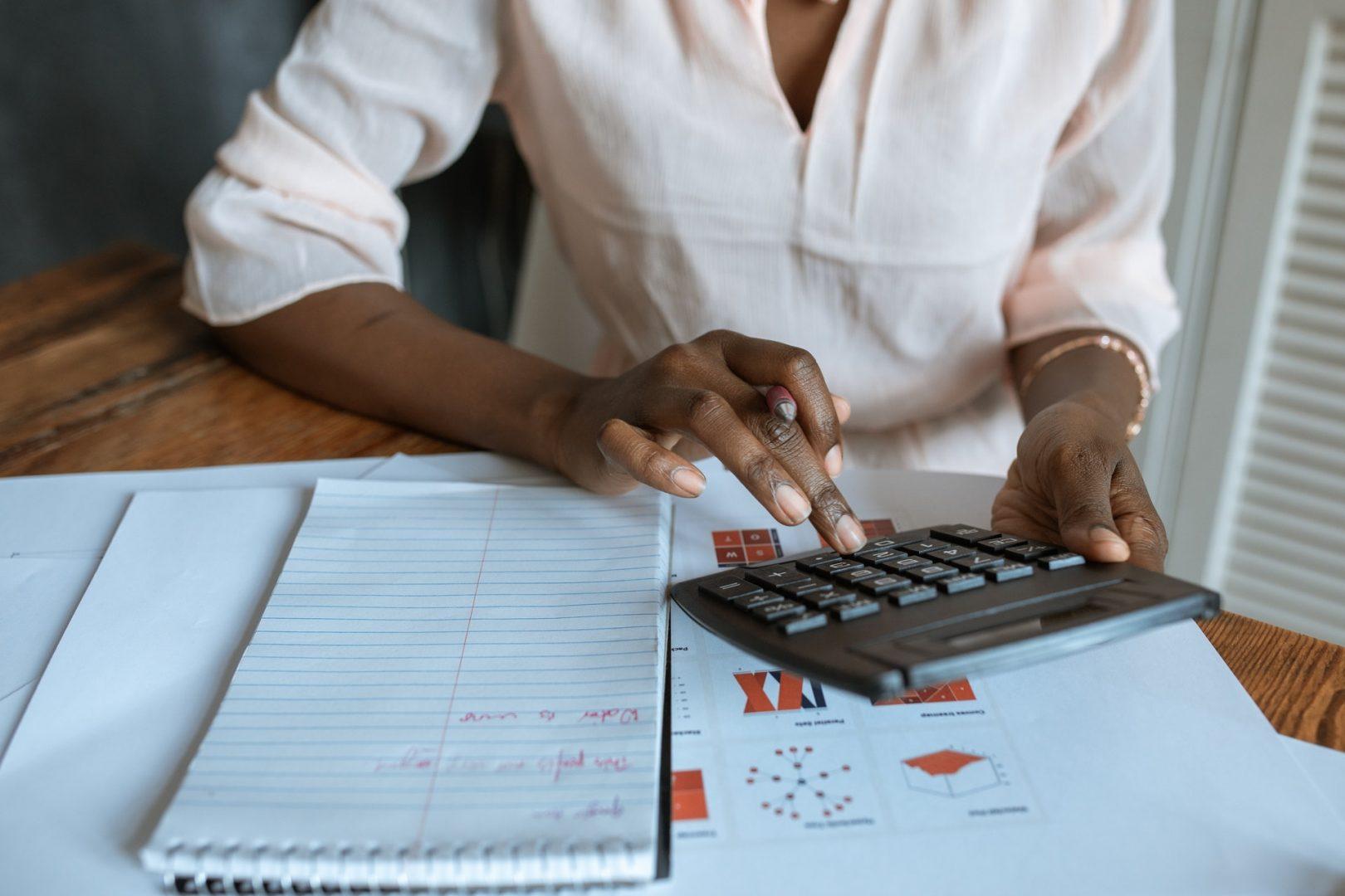 Woman using a calculator